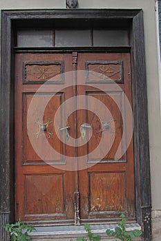 A wooden doubled winged door