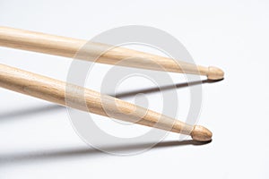 Wooden drum sticks on white background.