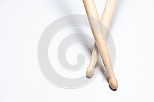 Wooden drum sticks on white background.