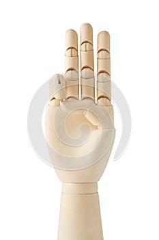 Wooden dummy hand with three fingers up