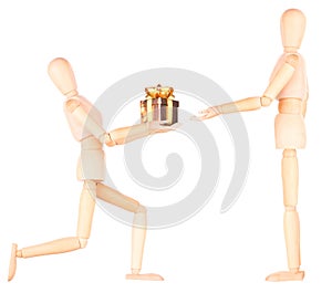 Wooden Dummy holding gift with ribbon