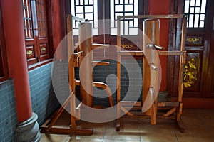 Wooden dummy is used in Chinese martial arts training. photo