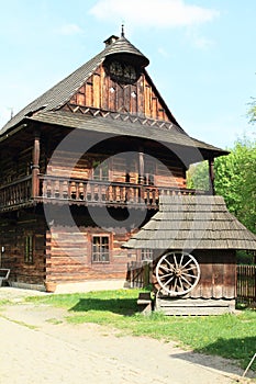 Wooden dwell with timbered city house photo