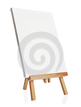 Wooden easel with blank canvas