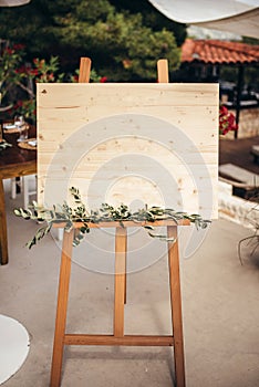 Wooden easel with a board