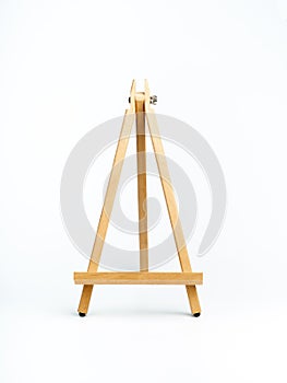 Wooden easel isolated on white background, vertical style.