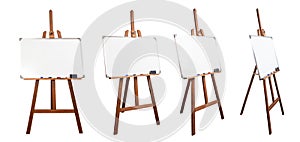 Wooden easel with a magnetic white board isolated on white, different sides angles, abstract backdrop