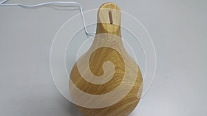 Wooden electric humidifier isolated on a white ba