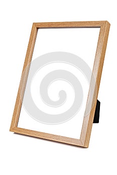 Wooden empty photo frame on white background