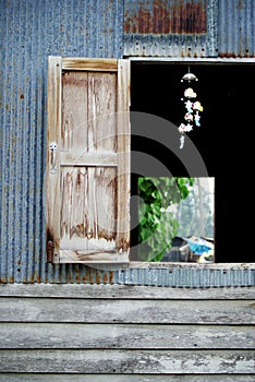 Wooden entrace to a building, opened doors photo