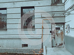 Wooden entrance door to a modern city house.