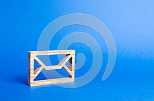 Wooden Envelope. mail address. Internet technologies and contacts. Communication over the network. Providing links and contacts