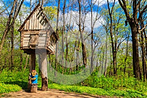 Wooden fairytale house of Baba Yaga in Krasnokutsk park, Kharkiv region, Ukraine