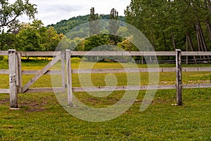 Wooden fence around horse ranch