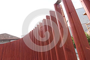 Wooden fence as demarcation to other land