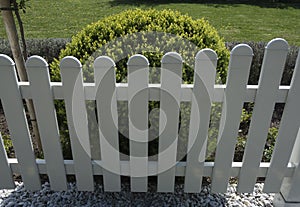 Wooden fence as demarcation to other land