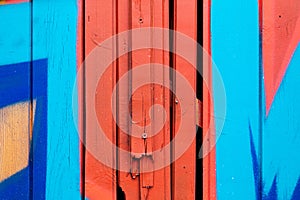 Wooden fence, background with wood planks painted with paint in close-up