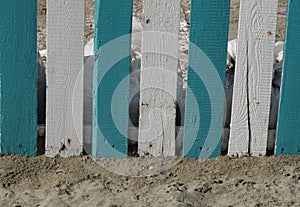 Wooden fence blue and white photo