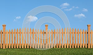 Wooden fence on grass