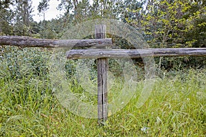 Wooden fence on grass area photo