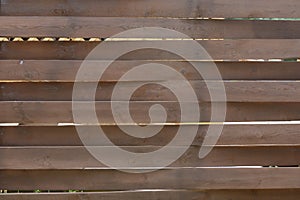 Wooden fence made of horizontal boards