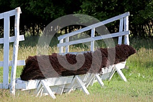 Wooden fence obstacle for an equestrian cross country event