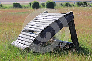 Wooden fence obstacle for an equestrian cross country event