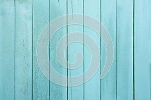 The wooden fence old blue color as a background or texture. Vintage painted wooden boards