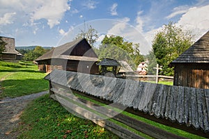 Wooden fence  in open air museum near Bardejovske kupele spa resort during summer