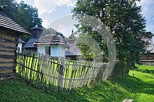 Wooden fence  in open air museum near Bardejovske kupele spa resort during summer