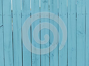 Wooden Fence painted bright blue