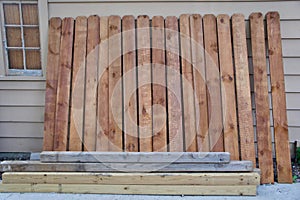 Wooden Fence Pickets and Fence Posts photo
