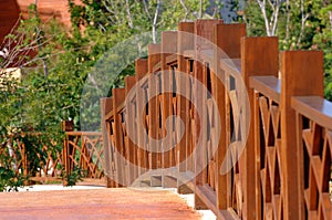 Wooden Fence Railing Across Bridge