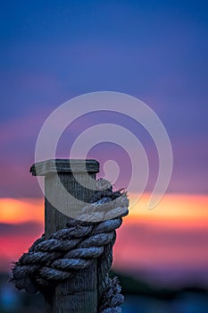 Wooden fence rope and Cornish sunset sky