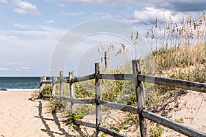 Wooden Fence on Sandy Pathway to Beach at Sandbridge