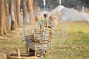 A wooden fence to the plantation in the garden