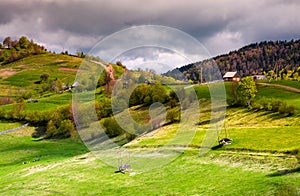 Wooden fences of rural area on grassy hillsides