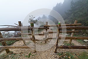 Wooden fencing in the mountains to prevent the passage of animals and vehicles. Morcuera photo