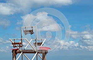 The wooden Ferris wheel and bright blue sky at Windtime Khao kho , Phetchabun.