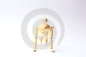 Wooden figure doll with push up emotion for sport exercise concept on white background