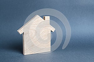Wooden figure of a house. concept of buying and selling real estate, rent, investment. Home, Affordable housing, residential