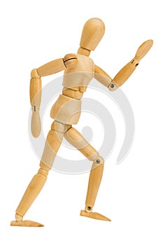 Wooden figure in running action