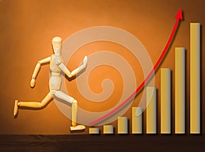 The wooden figure running on stairs of business plan