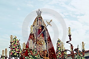 Wooden figure of Saint Catherine taken in procession. photo