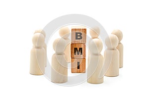 Wooden figures as business team in circle around acronym BMI Body Mass Index