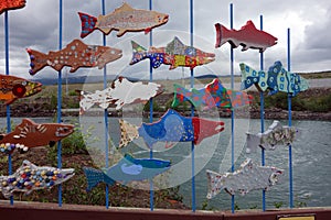 Wooden fish art at the salmon ladder in whitehorse.