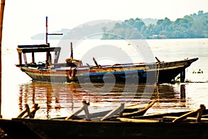 A wooden fishing boat at Brahmaputra Rive Assam India