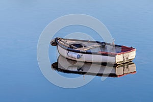 Wooden fishing boat in a calm sea