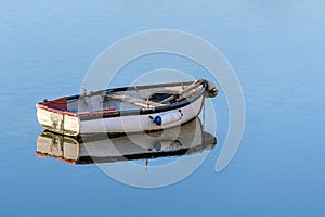 Wooden fishing boat in a calm sea