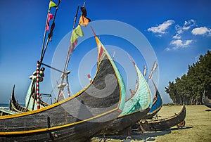 Wooden Fishing Boat On a Coxbazar Sea Beach With Blue Sky Background in Bangladesh